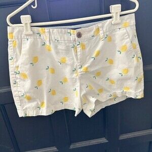 Old Navy white shorts with lemon print Button and zip closure pockets Size 6